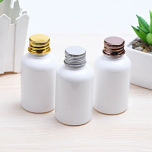 white plastic bottles with aluminum screw lids