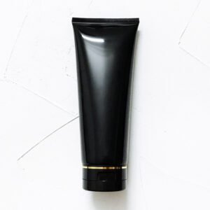 black tube with gold lining